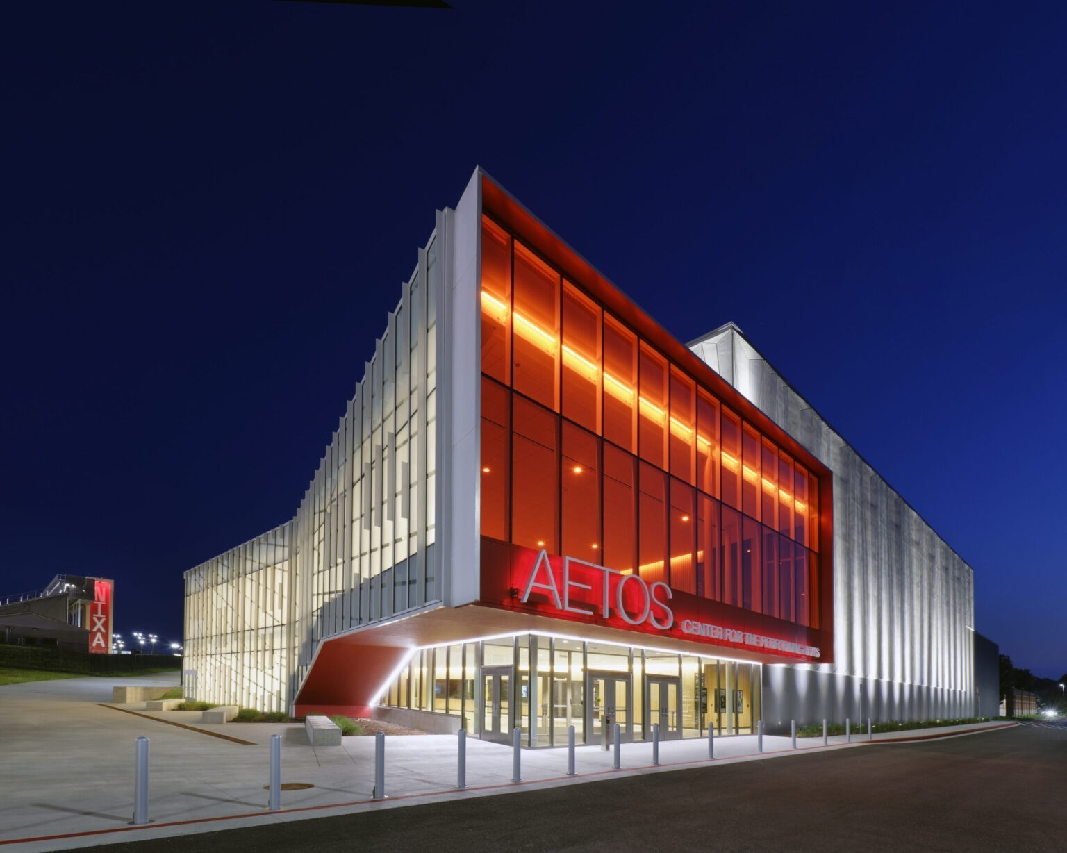 Nixa High School Aetos Center for the Performing Arts Red Illuminated Entry